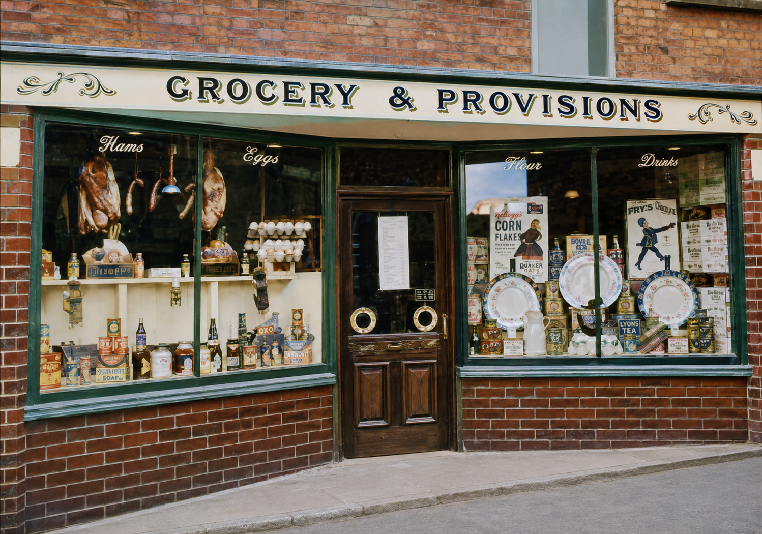 Co-op Grocery & Provisions shopfront — Kellogg's, Fry's Chocolate, Lyons Tea, Bovril, Sunlight Soap